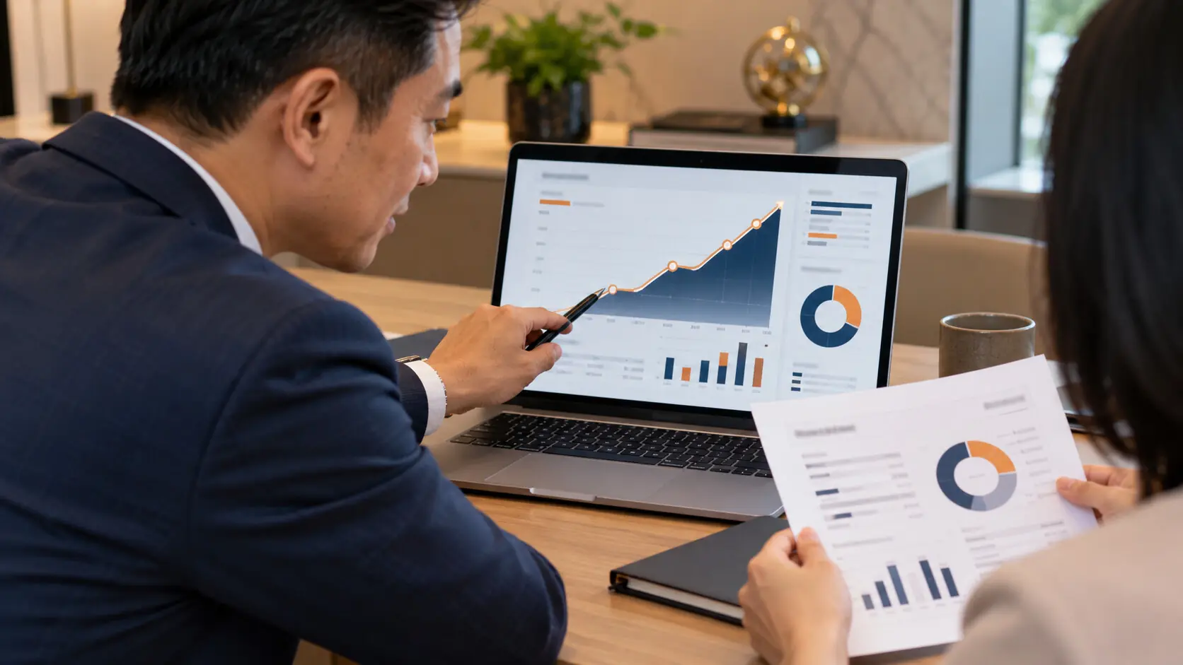 Advisor reviewing investment portfolio with client